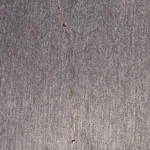 Elegant Gold Necklace with Saturn Pendant